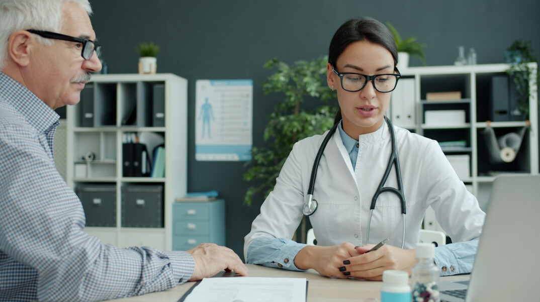 doctor talking to patient