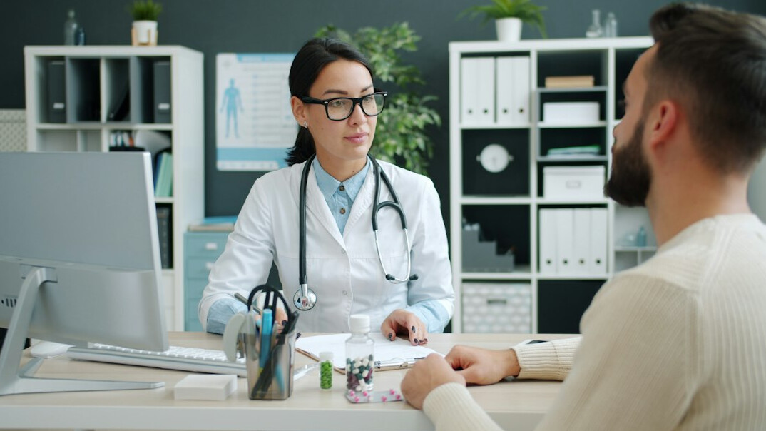doctor talking to patient